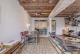 As part of the renovation, the current owners restored the original Catalan vault ceilings, which are comprised of bricks resting over parallel wooden beams to form a rippling, arch-like shape.  Photo 2 of 11 in A Refurbished Flat With Catalan-Vaulted Ceilings Lists for €760K in Barcelona