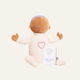 Designed to soothe fussy infants and help them sleep—as if next to their caregivers all night—this plush‚ unassuming doll contains a speaker that plays a recording of the breathing and heartbeat of a resting adult.&nbsp;