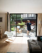 A slide-and-pivot door leads directly from the living room to the deck.