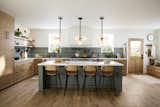 A kitchen with Rejuvenation’s new Allenglade pendants and sconces.