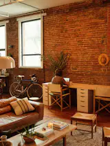 Bronte made the 10-foot long desk out of a slab of butcher block and IKEA drawers.