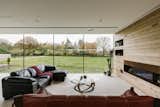Local architecture practice Vincent &amp; Brown designed the single-story residence in 2019. On the west-facing side of the home, full-height glass windows overlook the surrounding landscape.  Photo 2 of 16 in A Glass-Walled Home Overlooking the English Countryside Lists for £1.1M