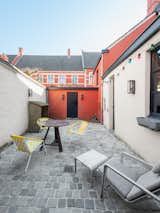 The enclosed courtyard offers views of nearby protected heritage buildings.