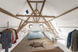 Under the original wooden truss on the 2nd floor you will find the master bedroom with spacious, open dressing.  Photo 14 of 16 in Live in a Transformed 17th-Century Religious Landmark in Ghent, Belgium for €1.95M