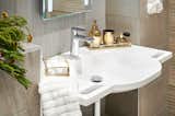 The sink basin offers integrated hand grips.  Photo 7 of 7 in Designer Ed Warner Is Creating Stylish Bathrooms for People With Disabilities