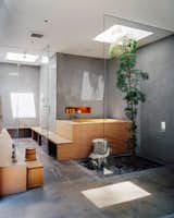An homage to Japanese culture, the bathing area includes a steam room and a custom hinoki ofuro (soaking tub) next to a Ming aralia tree. "The house is very particular, and in some ways it’s very ‘designed,’ but it’s also really informal,