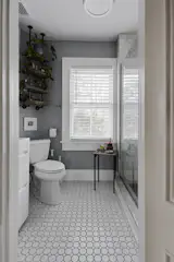 In total, the residence includes two full baths and one half bath.