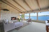 Throughout the 3,621-square-foot home, huge picture windows frame impressive coastal views.