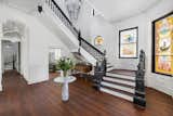 "Beyond the leaded-glass entry door is a stunning grand foyer," says the listing agent. "The residence boasts 13-foot ceilings on all three floors, newly refinished original hardwood floors, historic stained glass windows, multiple fireplaces, and restored original decorative hardware."&nbsp;