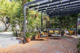 "Behind the home is shaded pergola, a garden with citrus, pomegranate, loquat, and avocado trees, and a delightful bubbling fountain," says the listing agent.