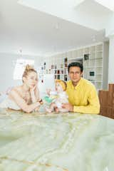 A family portrait of Gioia, Jonathan, and Zadie in the kitchen of their Vienna home.