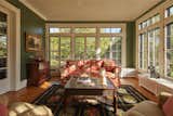 A peaceful sunroom looks out over the surrounding grounds.
