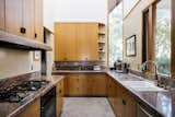 "The partially vaulted kitchen incorporates a two-story mitered window, as well as skylights and clerestory windows," says the listing agent.