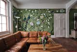 The current homeowner, artist Lucy Lyons, embellished one of the reception room’s west-facing walls with a meticulously hand-painted botanical mural.