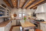gourmet kitchen with wolf and subzero appliances  Photo 6 of 14 in This Classic Pueblo-Style Home in Santa Fe, New Mexico Could Be Yours for $2.3M