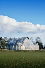 Automated glass panels in the roof open and close to regulate the temperature inside the greenhouse and core home and protect against common garden pests, heavy wind, and snow. "The glass is UV-protected, so you don’t have to worry about burning," Roja says. 