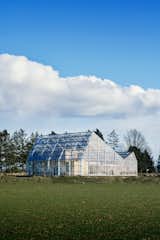 Automated glass panels in the roof open and close to regulate the temperature inside the greenhouse and core home and protect against common garden pests, heavy wind, and snow. "The glass is UV-protected, so you don’t have to worry about burning," Roja says.