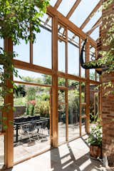 "At the&nbsp;south side of the house, the double-height conservatory provides a seamless transition between the house and the gardens," says the listing agent.