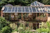Award-winning Nottingham firm Allan Joyce Architects designed the seven-bedroom Garden House in the Westhorpe hamlet of Southwell, an old market town in Nottinghamshire, England.  Photo 2 of 14 in For £1.65M, This English Home With an Attached Greenhouse and Walled Garden Could Be Yours