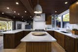Updated kitchen with ample counter space, storage, and central island