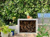 The backyard features a firewood nook, for keeping warm or cooking up dinner al fresco.