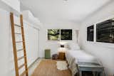 The third-unit bedroom, looks into the deep green vegetation on the property, and offers great storage with lots of closet space.&nbsp;