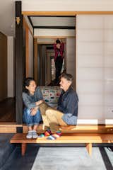 After looking at dozens of disappointing newer homes, designers Junko Uchiyama and Christopher Flechtner (here with son Nikki) decided to renovate a century-old machiya, or townhouse, in a historic section of Kyoto. Putting a playful spin on its classic style was an essential part of their vision.  Photo 1 of 12 in A Designer Couple Weave Fresh Elements Into a 107-Year-Old Kyoto Townhouse