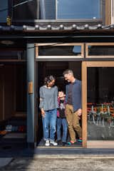 Like the other houses on the pedestrian-only street, their home comes right up to the pavement’s edge, but unlike any other, it greets passersby with a wide glass facade.  Photo 11 of 12 in A Designer Couple Weave Fresh Elements Into a 107-Year-Old Kyoto Townhouse