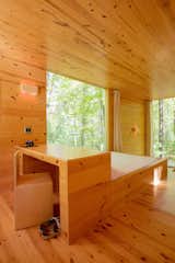 Lindstrom and Davidson designed much of the cabin's interior, including the bed frame, curtains, drawers, and custom stair railing.