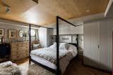 "The main bedroom is situated within the stern and combines oak parquet flooring with birch ply skirting and ceilings framed by wood-panelled walls. There are also built-in wardrobes, providing plenty of storage."
