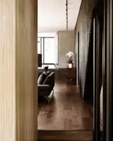 The house has a moody theme: All bathroom fixtures as well as door handles and even hidden hinges are black.