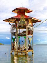 For an experience truly off the beaten path, this rustic tower rises out of the sea promising a vacation with few frills but great views.&nbsp;