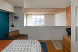 The second bedroom overlooks the living room, with ample light reaching through the windows found on the first level.&nbsp;
