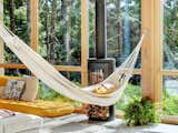 A hammock is quintessential to relaxing and taking in views of the verdant greenery.