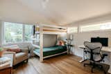 The amply sized secondary bedroom is encircled by windows, with access to great natural light.&nbsp;