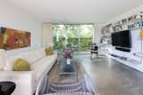 The den offers a beautiful place to relax, host, or entertain.