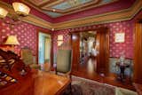 Detailed portraits and illustration grace the ceiling, an ornate juxtaposition to the repeating wallpaper.  Photo 8 of 23 in Asking $2M, a Striking Victorian-Style Home in San Diego Features All Its Original Trimmings
