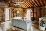 "Next door, the antique barn with its uniquely curved windows has been converted into a studio/guesthouse with a full bath and can be used as a home office. It is clad in Shou Sui Ban Cypress sourced from Japan."
