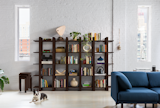 Burrow's Index Triple Bookcase and Stools in walnut finish.