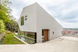 "Situated above the Stuttgart valley basin, in a prime semi-hilly location, the villa captivates with its sculptural, monolithic form,"&nbsp;explains the listing agent.&nbsp;"From the Stuttgart valley side, the property looks like a huge worked rock."