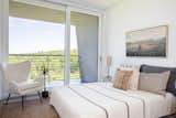 One of the bedrooms has a private terrace that offers views of the surrounding scenery.