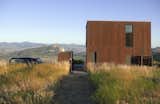 The house was originally a slate-like color similar to the kitchen island, but has changed to rust over time. "Which is what we were really hoping for,