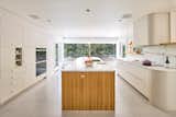 Kitchen of Portland Heights Home by TVA Architects and Bright Designlab