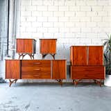 a series of  midcentury modern dressers stacked on top of one another