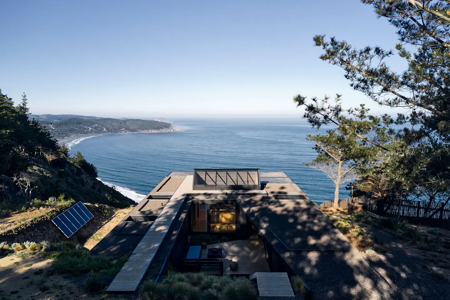 Photo 9 of 11 in A Surfer Couple Build an All-Black Off-Grid Cabin on a ...