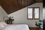 Archier custom designed the bed and side table, and the terrazzo vase is by local ceramicist Tantri Mustika.