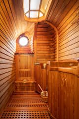 A hand-hewn teak sauna can be found down the hall from the home office on the upper level.