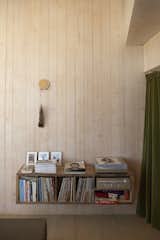 The couple says there is barely any internet at Sky House, so they rely on their record collection, as well as books and board games, for entertainment. The floating shelf was made of wood found on the property.