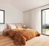 The bedroom has windows on two sides.