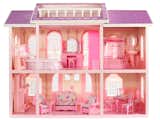 The back view of 1990 Barbie’s Magical Mansion, which features patterns and influences from decades prior.